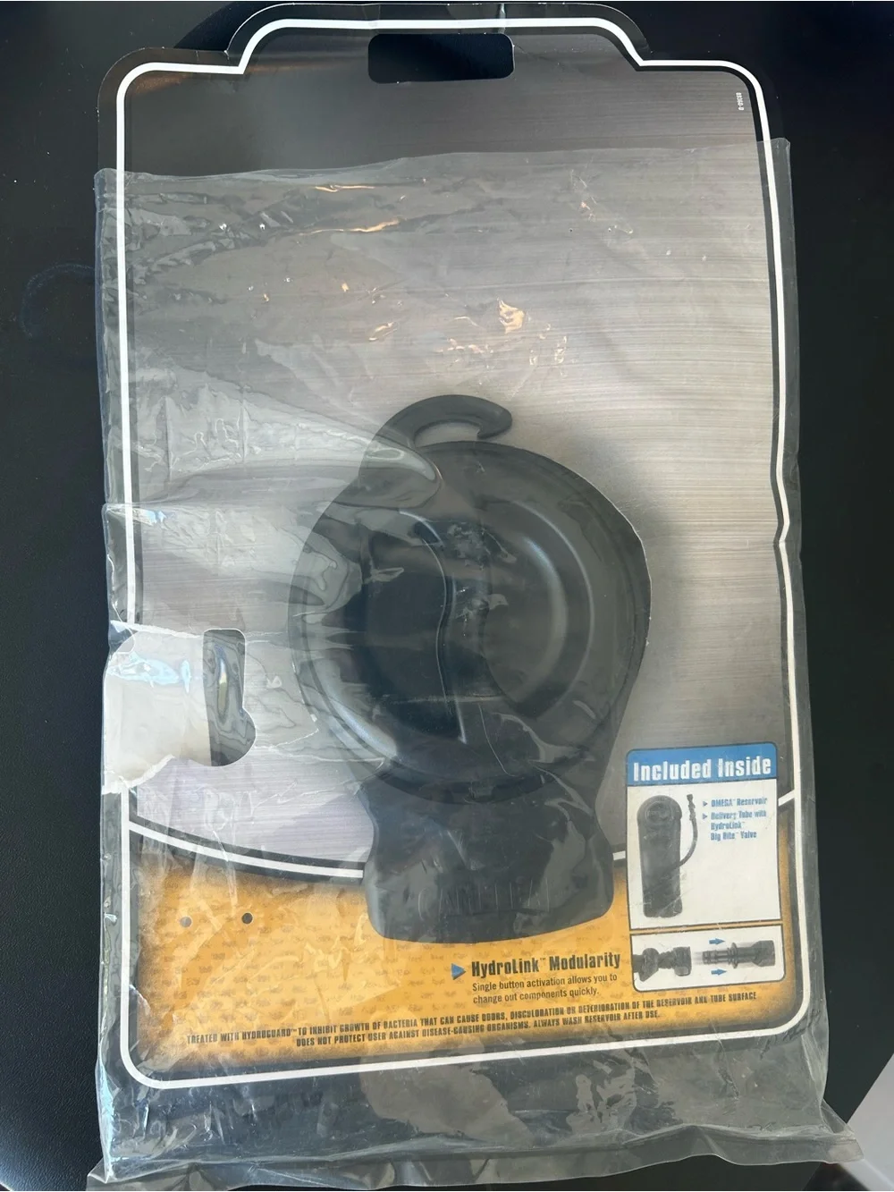 CamelBak Hydration Pack Gray with Blue Tube & Extra Omega Reserve bag.